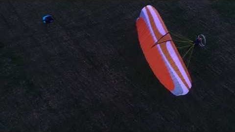 Drone chasing Paramotor in Sweden sunset