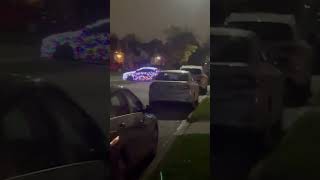 Car Wrapped in Lights Glows Like a Holiday Parade