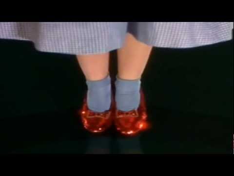 who made her wear ruby slippers?