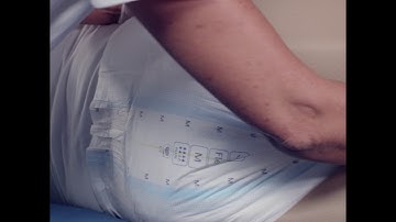 Instructions for how to apply a TENA Flex on a user from the front 1 1