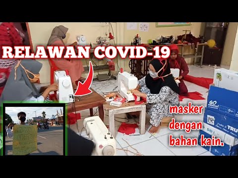 Relawan covid 19 membuat masker dengan bahan  KAIN  BAJU  