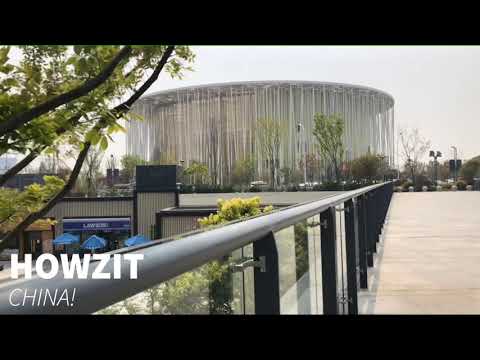 Video: Steven Chilton Architects Merancang Wuxi Show Theatre Dengan Kolom Putih Dan Kanopi Emas
