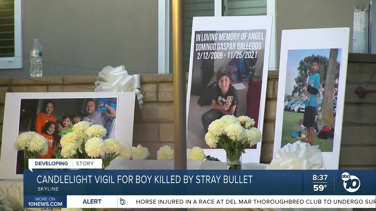 Family & friends hold candlelight vigil for boy shot and killed on ...