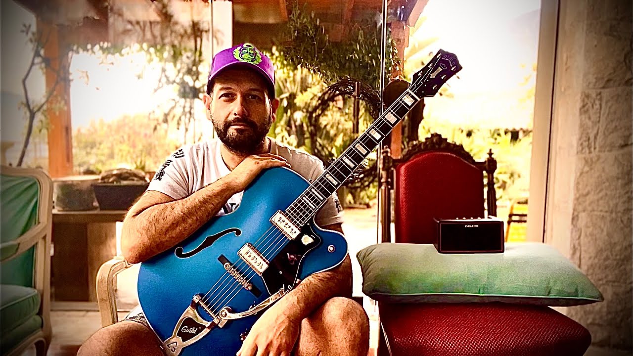 Can we make a hollowbody electric guitar sound like an acoustic guitar