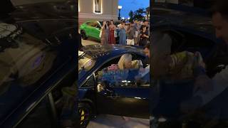 Elegant Woman Getting Out Lamborghini With Help