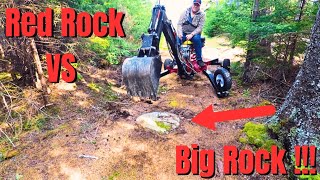 Using my Red Rock /TrenchermanTowable Backhoe From Princess Auto to dig up a BIG ROCK !!!!