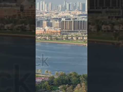 view of beautiful park and river with new modern buildings   in Deira and Dubai Creek,