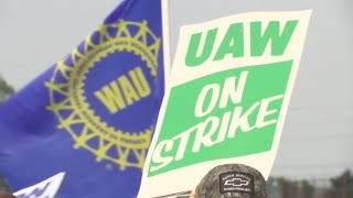 GM, striking workers both feel financial pinch