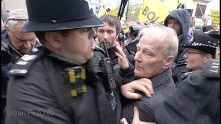 Dozens Of Police Confiscate Anti-Monarchy Banner From Protesters On Coronation Morning In London