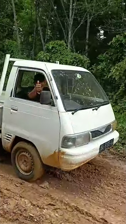 Ketangguhan futura vs mitsubishi di jalan licin