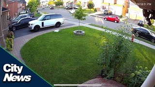 Surveillance video shows violent carjacking from Brampton home