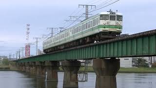 信濃川橋梁を走行する115系N35編成（リニューアル車） 2次新潟色