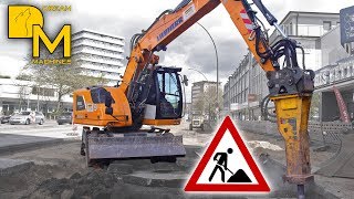 versatile genius LIEBHERR A918 wheel excavator showing skills in road construction excavator video