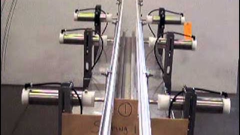 Anysize Automatic Infinite Guide Rails on AMT Neck Ring Air Conveyor, Position 1