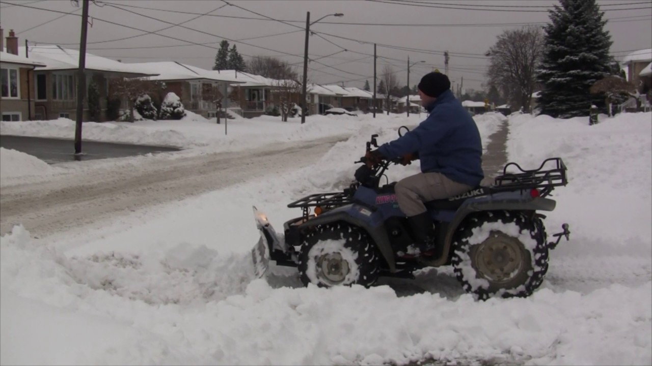 King Quad 300 Plowing Driveway YouTube