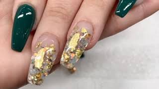 Green and clear coffin nails design the leafs and glitters.