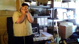 Nic Clark on chromatic harmonica a cappella chords
