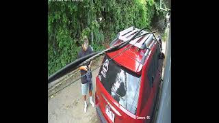 Sudden Earthquake Rocks SUV While Man Loads Trunk