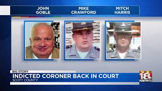 Indicted Coroner Back in Court