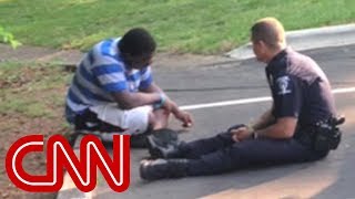 Photo of police officer consoling teen goes viral