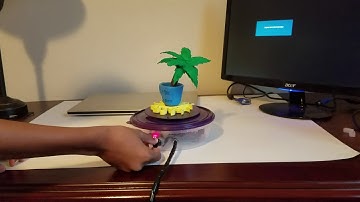 Rotating display tables with 3d printed cup