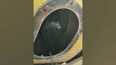 Ajax programming /and removing concrete waste/ in drum.