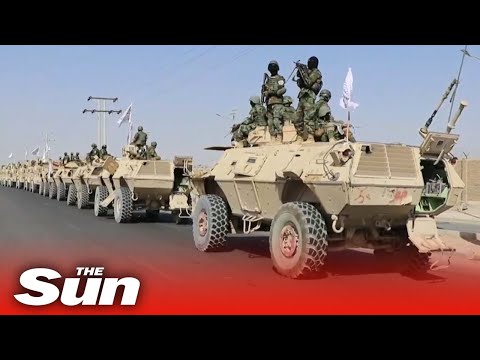 Taliban forces flexes military might with armed forces parade