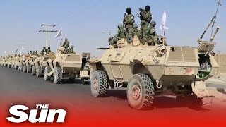 Taliban forces flexes military might with armed forces parade