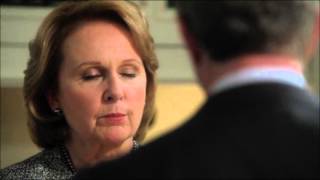 Cyrus shows Sally the photos of Daniel Douglas & James