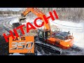 Ensimmäinen Hitachi ZX350-7 lastaamassa autoja Espoossa helmikuussa 2021.