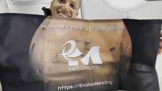 Dr. Sian "Leo" Proctor Unfurling ExploreMars.Org Flag in Space!