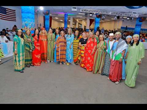 በዓል ናጽነት ዋሽንግተን-ዲሲ፥ናይ ብሄረ ዓፋር ኣልባሳት ተኸዲኖም ነቲ ሃብታም ቀይሕ‐ባሕሪ ወነንቲ ምዃና ንምንጽብራቕ ናብ መድረኽ ክኣትው እንከለዉ።