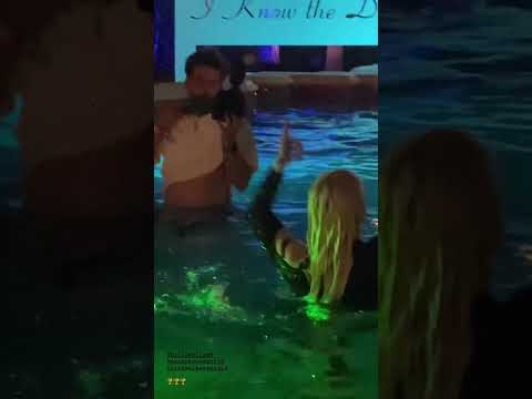 Billie Eilish celebrating in the pool 