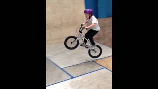 8 year old bmx rider on the pro boxes at ramp world