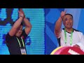 Weightlifting coaches react to their athlete's lifts
