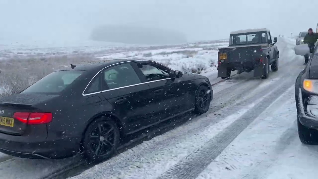Chaos and disruption caused by snow in Princetown, Dartmoor ahead of amber severe weather warning.