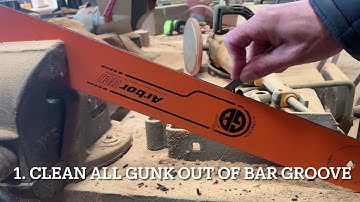 Servicing your chainsaw guidebar-how to clean it out, dress the rails and greases the nose sprocket.