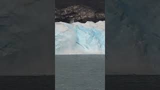 Part of a Glacier Collapses into Water