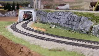 Double header Dash 8-40CM with a helper Gevo Tier 4. N scale