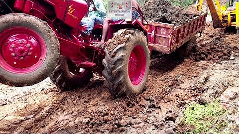 JCB Tractor Video - Mahindra 575 DI Tractor Stuck In Mud Rescued By JCB 3dx Backhoe Machine.
