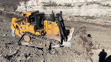 Excellent Operator Works With Caterpillar D9T Bulldozer Opening A New Ramp