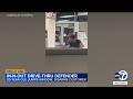 Man jumps through In-N-Out drive-thru window to stop armed woman