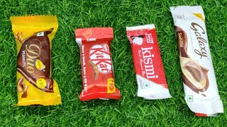 A some lots of candies, chocolate opening video, Cadbury celebrations, satisfying video