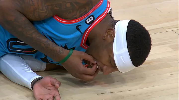 Giannis Antetokounmpo knocked out Torrey Craig's t...