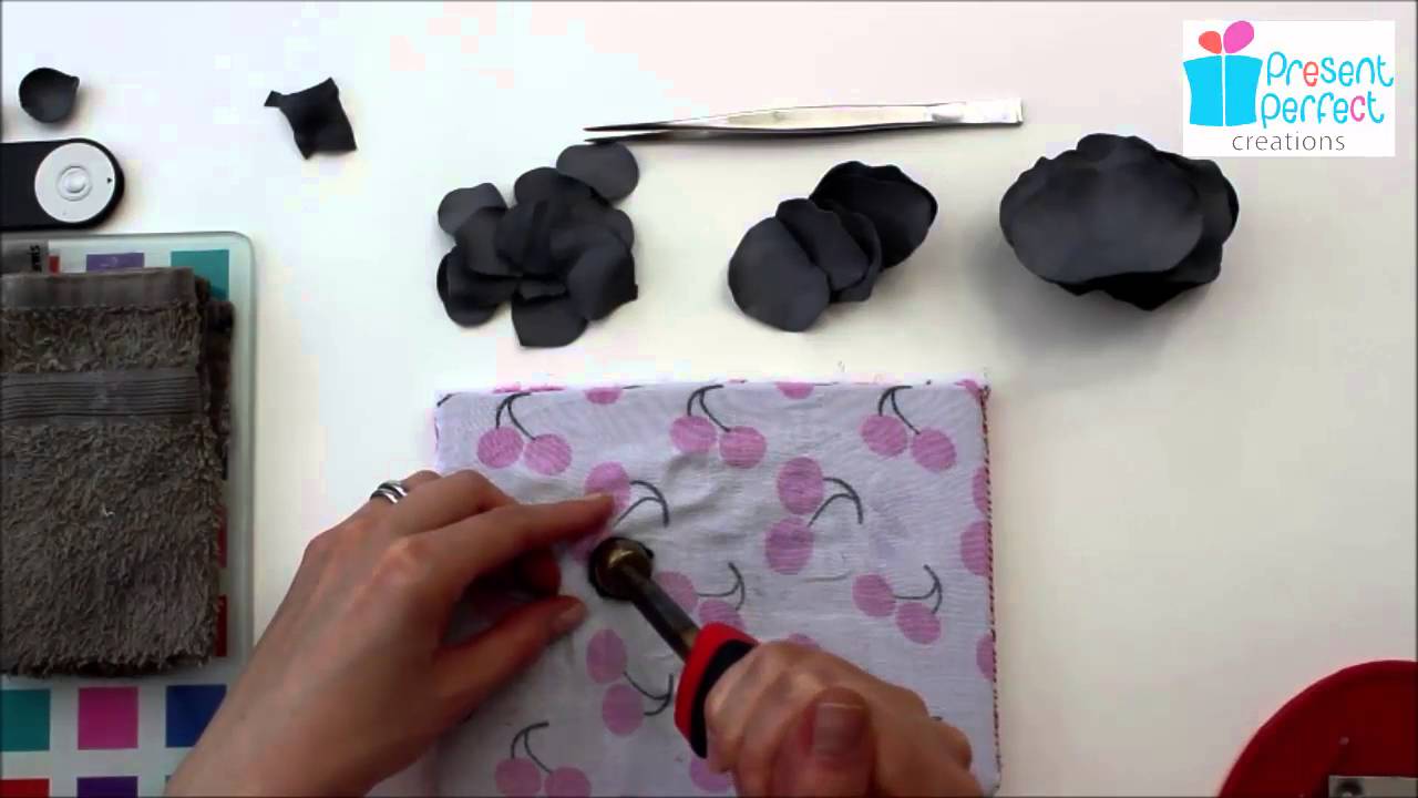 Shaping leather rose petals with millinery tools