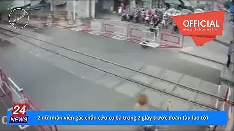 2 nữ nhân viên gác chắn cứu cụ bà trong 2 giây trước đoàn tàu lao tới