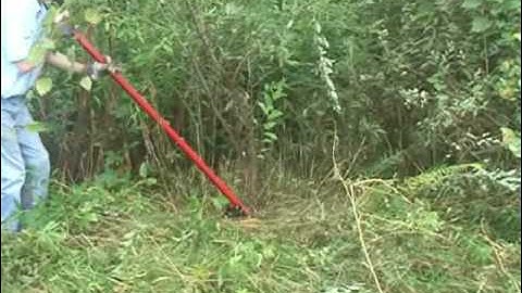 Removing shrubs -  with the bush removal tool called The Shrub Buster.
