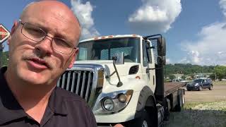 2014 Intl 7600 Tandem truck 24 foot flat bed with Moffett kit