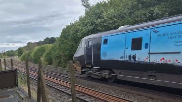 Train passing station house pontrilas class 67 and 82