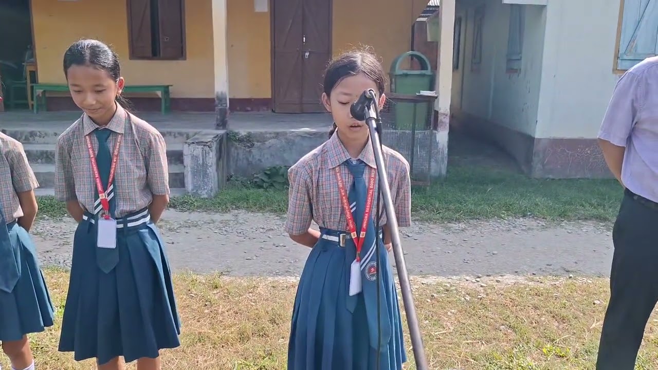 Dipika Basumatary of class five is speaking in the morning Assembly today.Jwngma School, Bijni.
